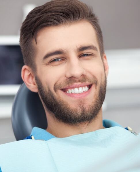 Man sharing healthy smile during preventive dentistry visit