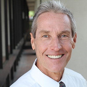 Man smiling outside