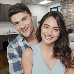 Smiling young man and woman in dental office in San Antonio