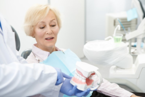 a patient attending their dental implant consultation